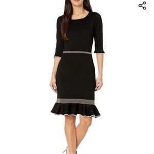 TAYLOR DRESSES RUFFLE HEM ELBOW SLEEVE SWEATER DRESS IN BLACK SIZE SMALL.